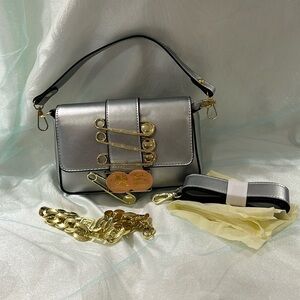 she is so FEN-TASTIC small but mighty. Crossbody or arm strap brand new